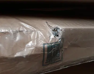 Golpe en el borde de una caja